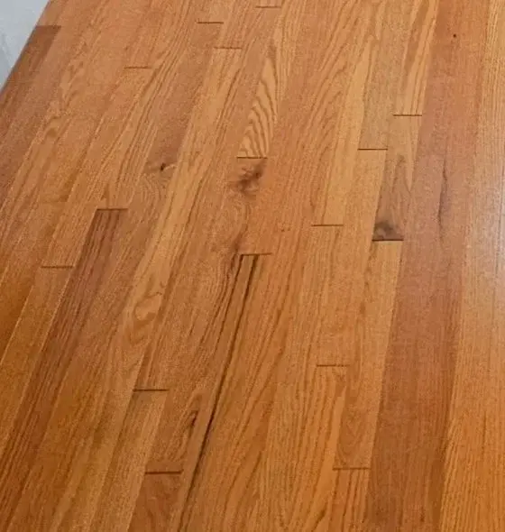 Close view of finished hardwood plank flooring