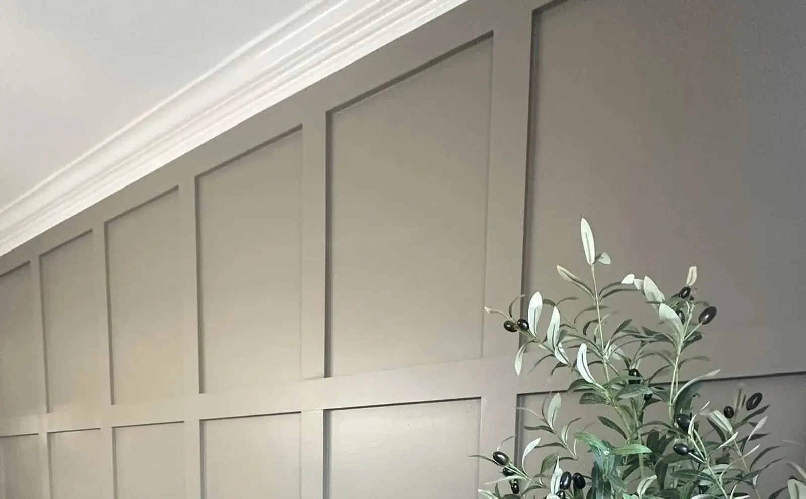 Finished painted wall paneling with crisp trim lines and balanced spacing