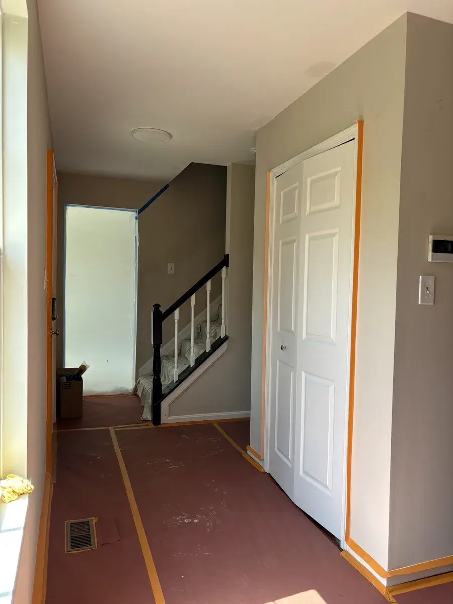 Hallway prepared for a coordinated wall and trim finish