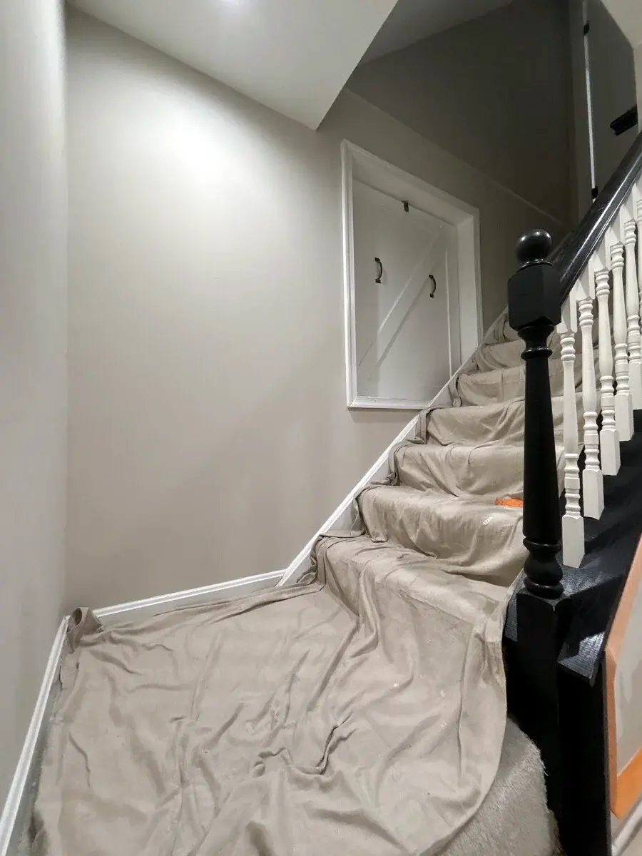 Staircase and floors protected during interior painting