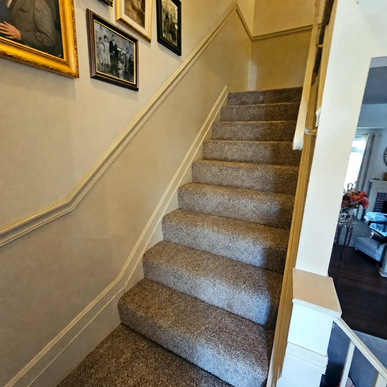 Carpeted stair run showing secure edges and consistent tread coverage