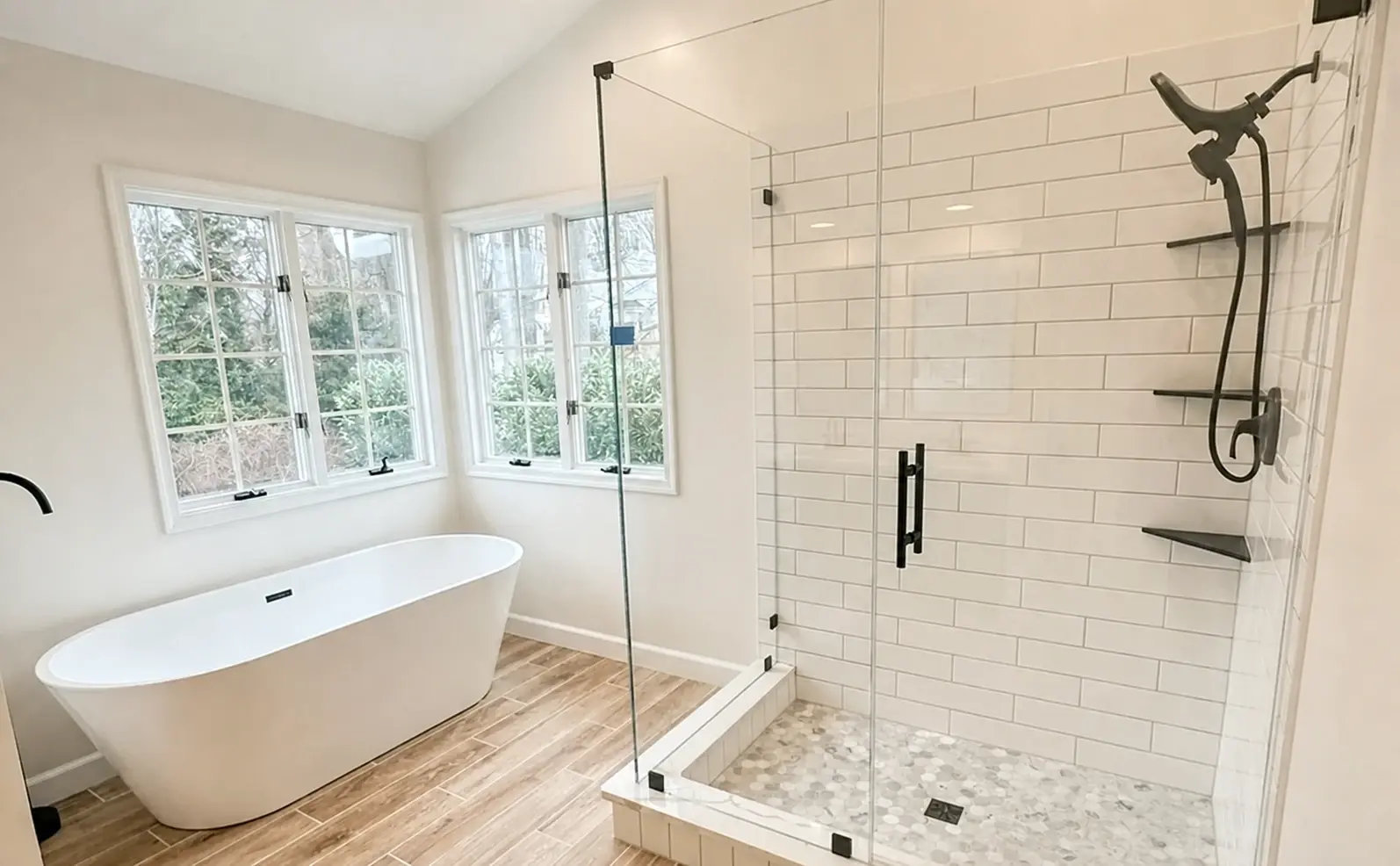 Finished bathroom and shower tile shown as a representative dense tile installation example