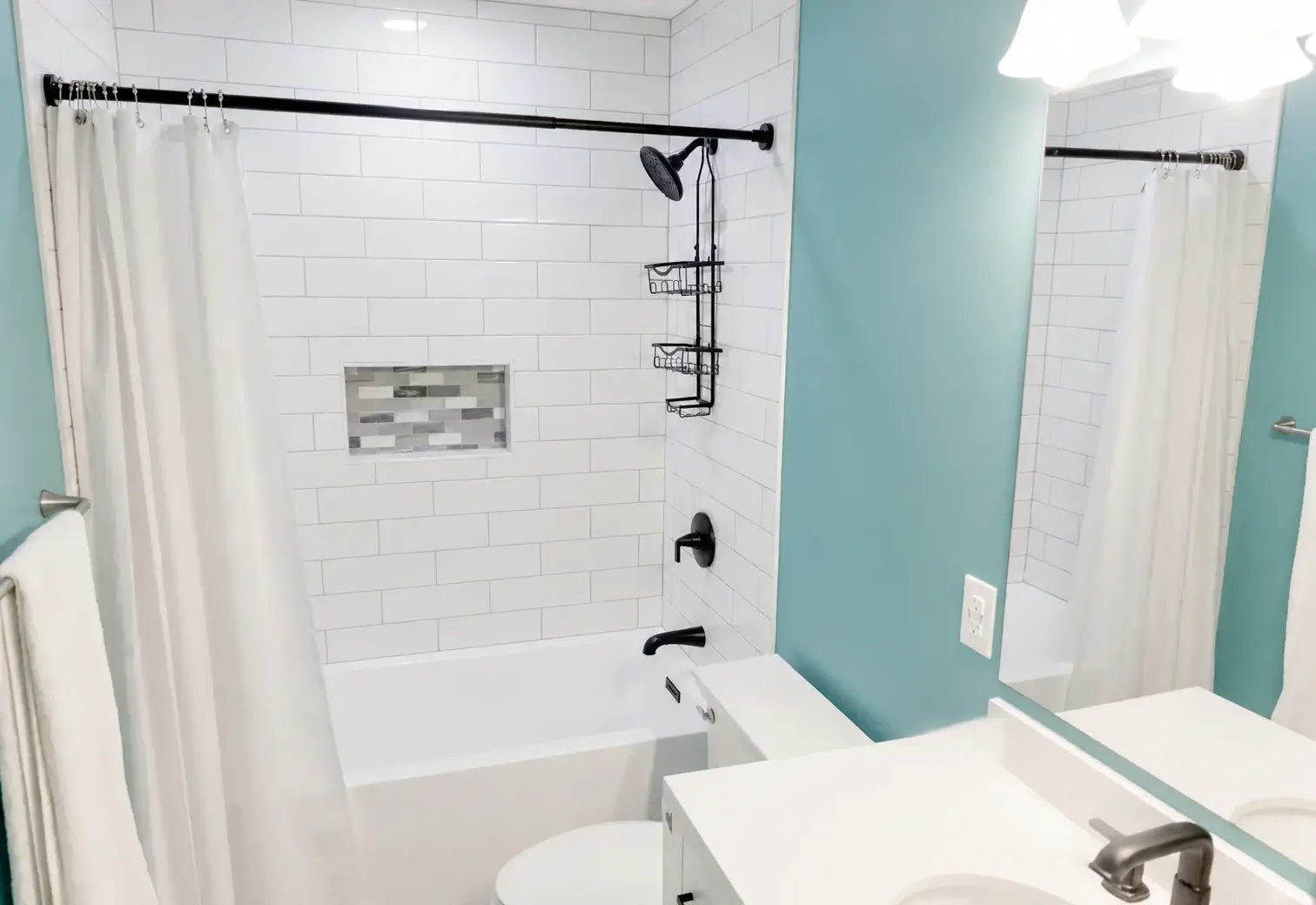 Finished straight-set white tile installation with measured horizontal rows