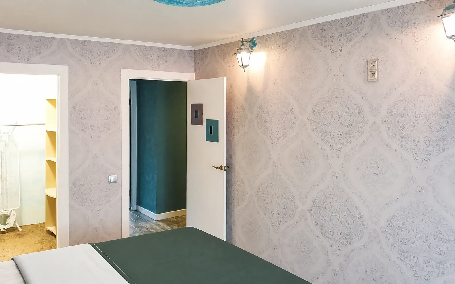 Finished wallpaper feature used as a refined focal wall in a residential room