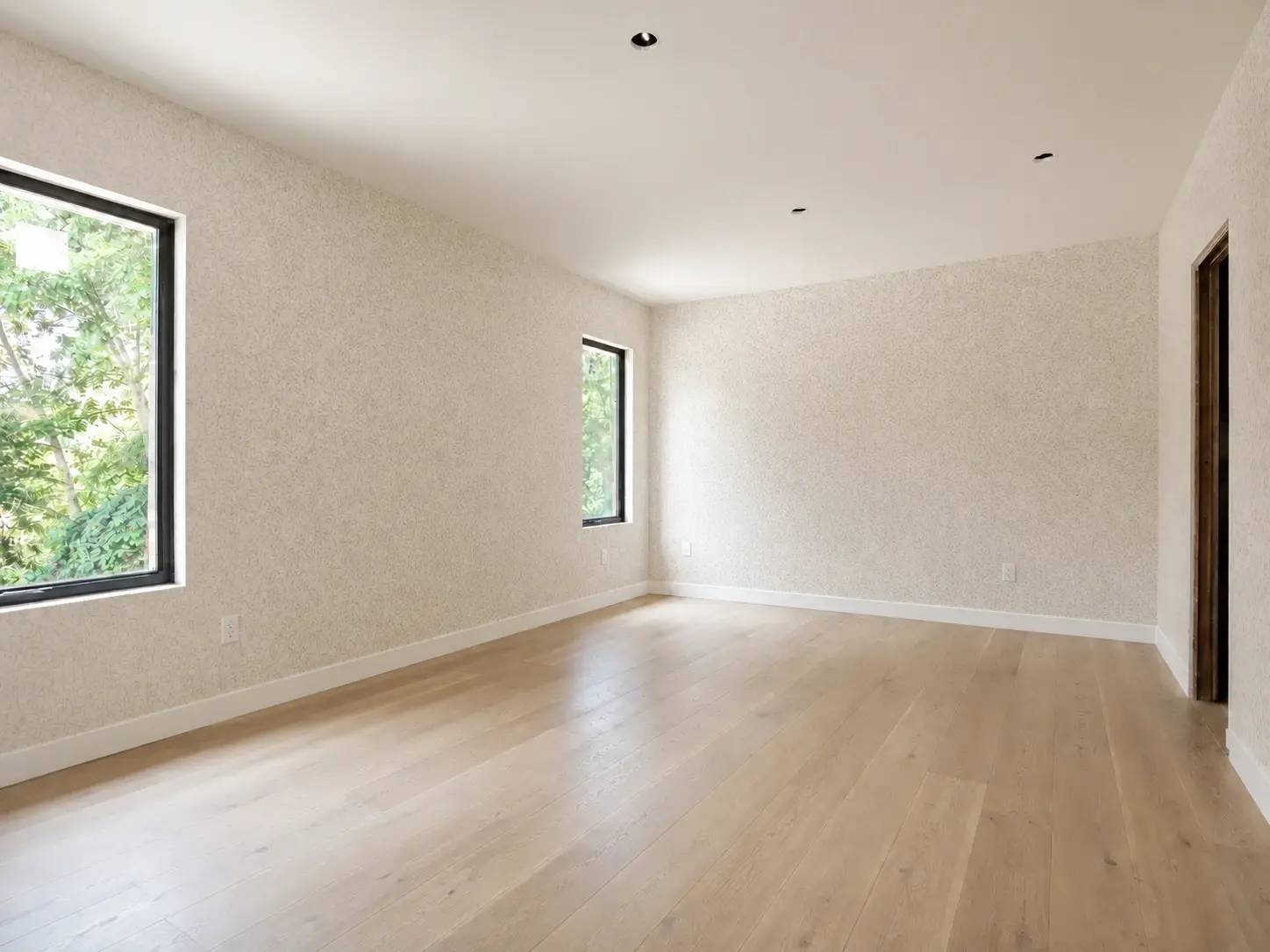 New finished wallpaper revealed over the old wall