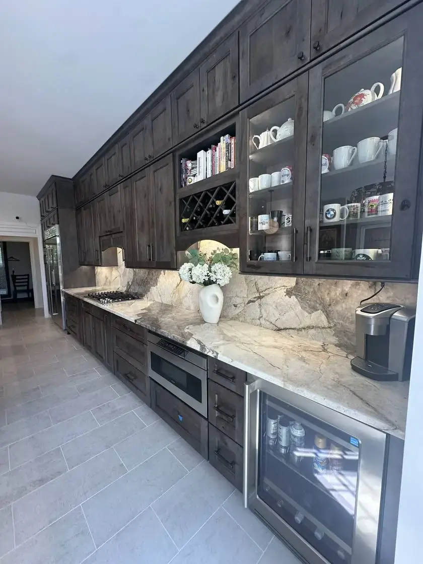 Dark cabinet feature with finished surfaces