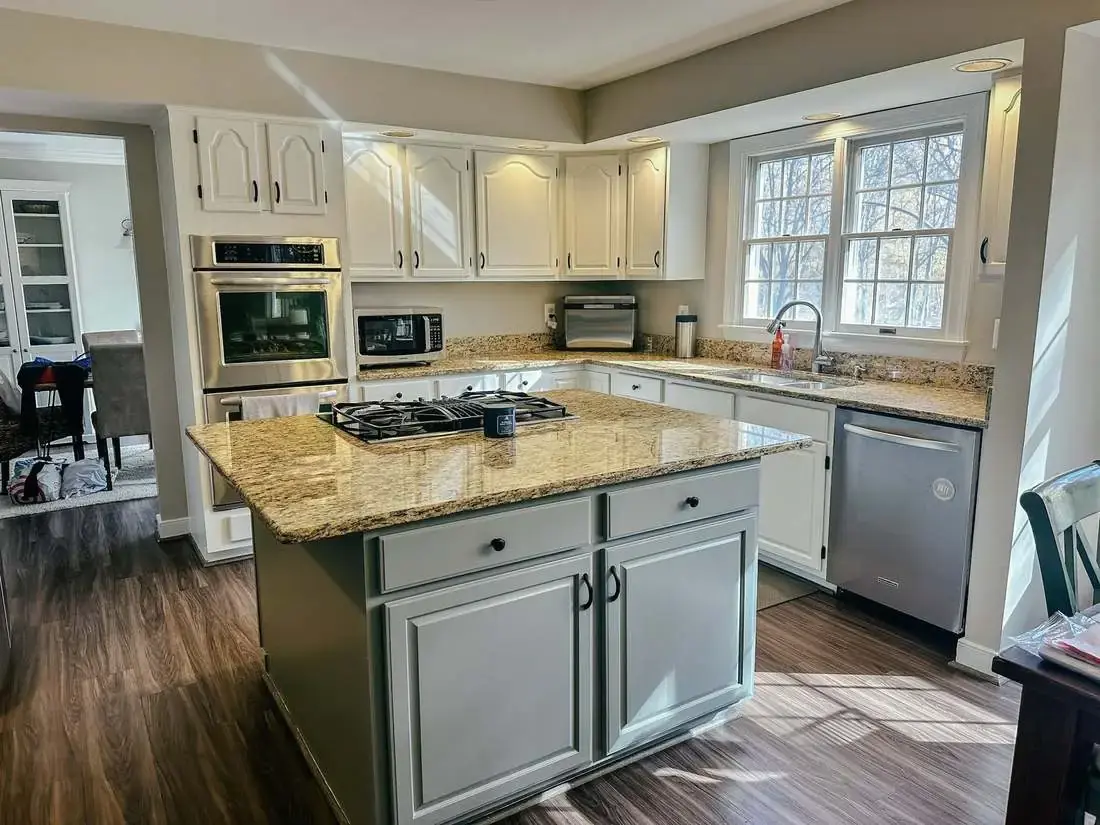 Finished kitchen with classic cabinetry and island