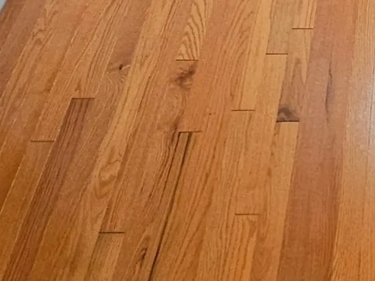Close view of finished hardwood plank flooring