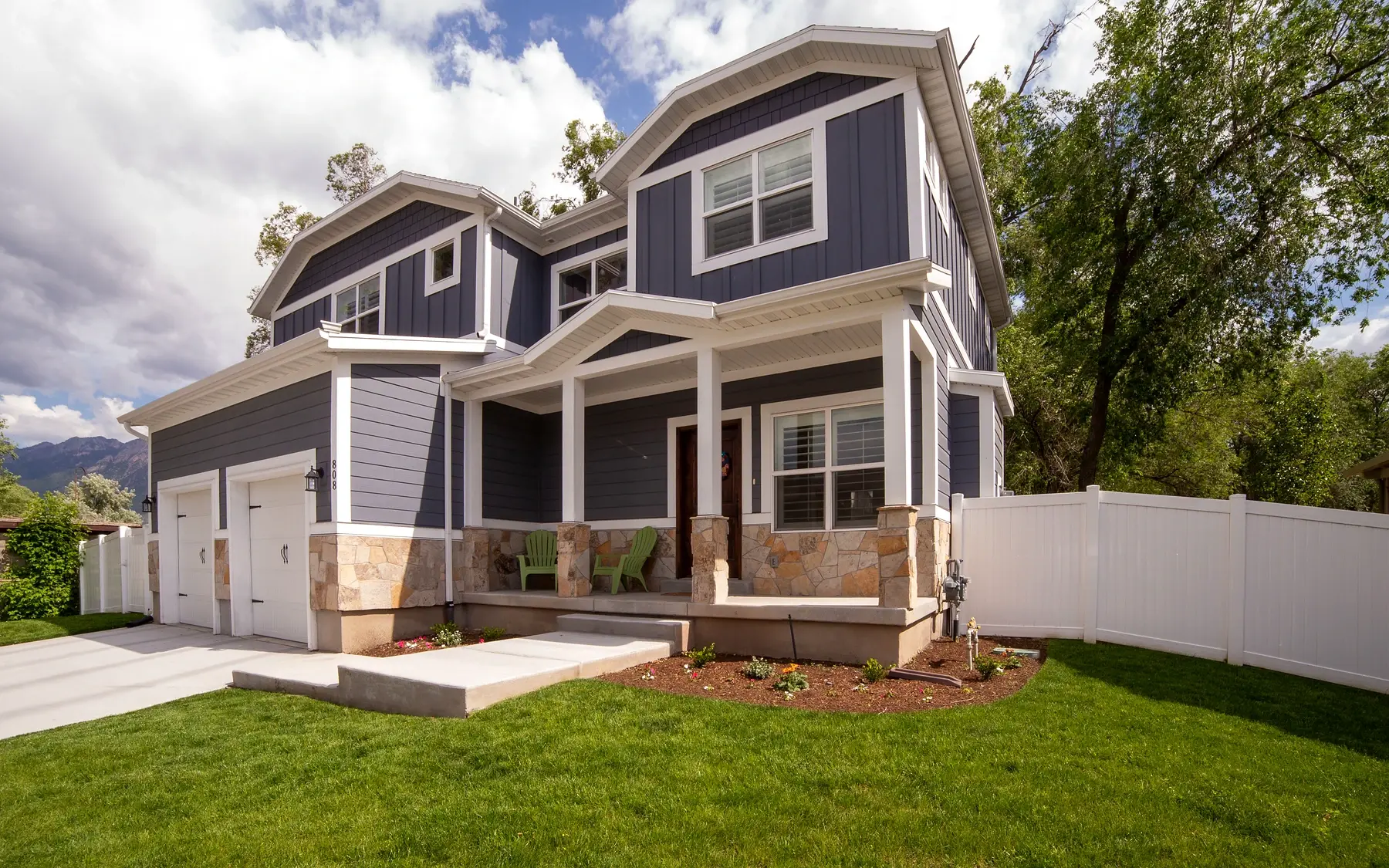 Finished residential exterior showing a complete painted elevation with strong curb appeal