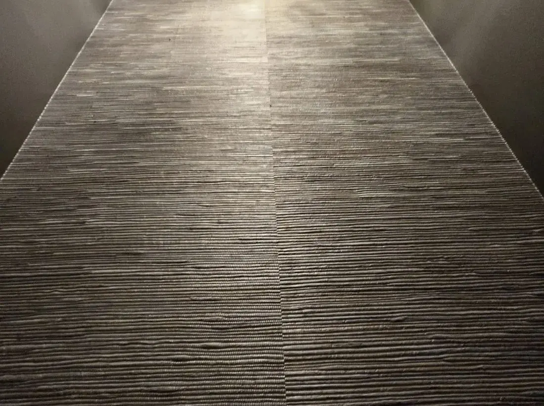 Existing dark textured wallcovering before a room update